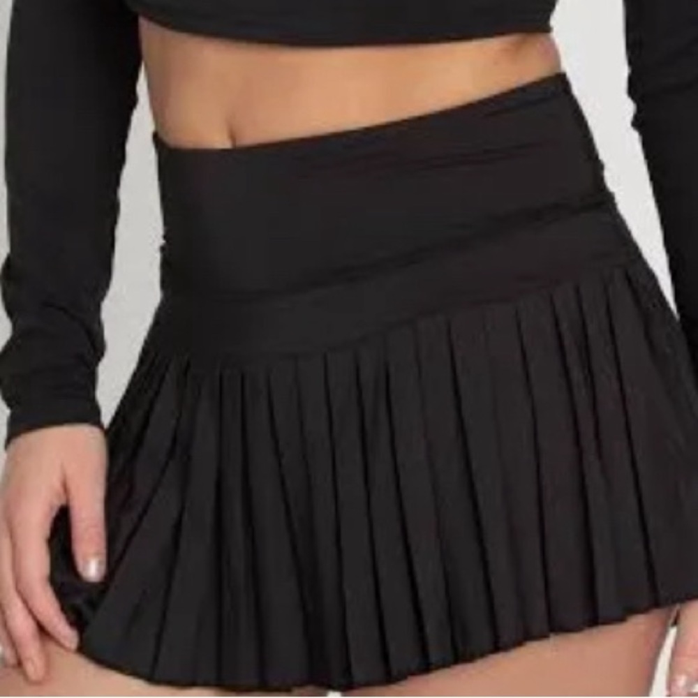 Black gold hinge skirt xs! Great condition, originally $49 selling for $25!